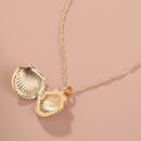 A Copper Shell Necklace That Opens